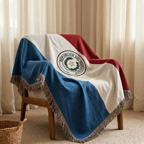 Paraguay Flag blanket with a emblem draped over a chair in a room with curtains and a basket.