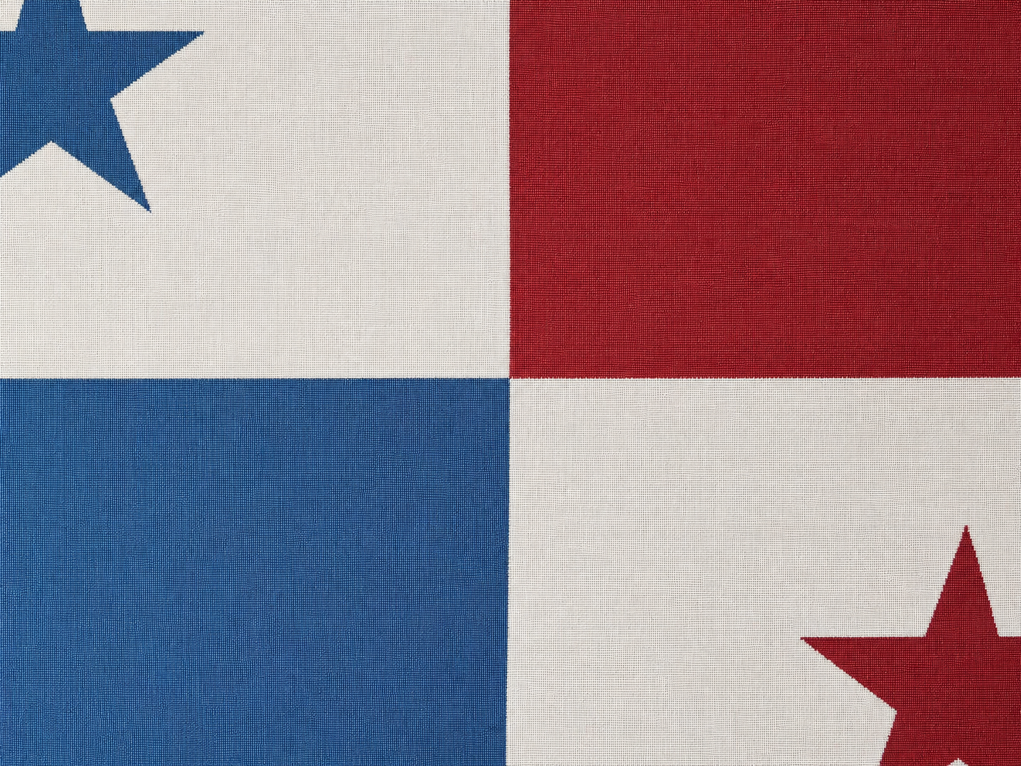 A close-up of a woven textile pattern Panamá woven throw blanket Ceibo House